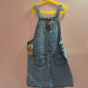 beautiful overall skirt never been used with its original tag.